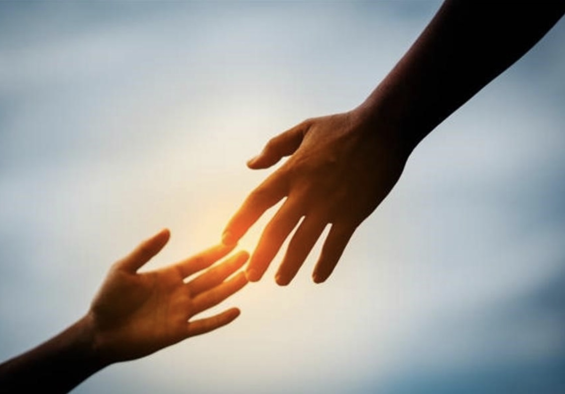 Hands reaching